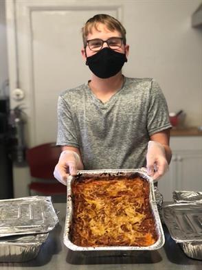 Cole Schulein cooked a full meal for 35 women at WISEPlace, a domestic violence shelter