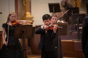 Zeen Zhou was invited to perform as a violin soloist for the Irvine Classical Players at the Summa Cum Laude International Music Festival