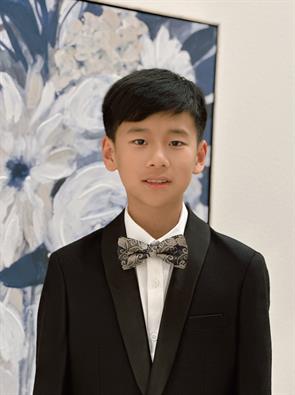 Zeen Zhou was awarded a full-tuition merit scholarship for the 2024 Interlochen Center for the Arts Summer Arts Camp six-week string program
