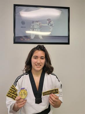 Alexandria Cartagena earned her 5th degree black belt in Taekwondo and was invited to teach at the National Taekwondo Academy