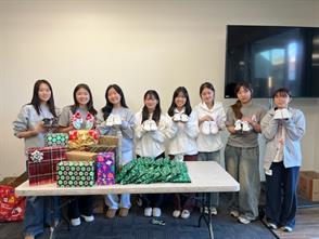 President of the Art in Hearts club, and her fellow leaders, donated over 30 pairs of hand-painted shoes to the children living at the Orange County Rescue Mission