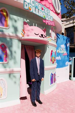 Logan Bailey made his feature film debut as the voice of Pandy Paws in “Gabby’s Dollhouse: The Movie"