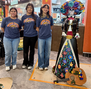Valerie Gil, Vivi Perez, and Emely Ramirez created La Catrina statue for the Mercado González Northgate Market La Catrina celebration and competition