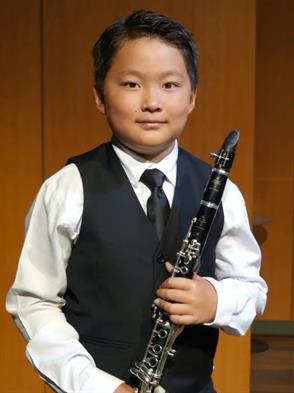 Adrian Kang won first place at International American Protege Music Competition